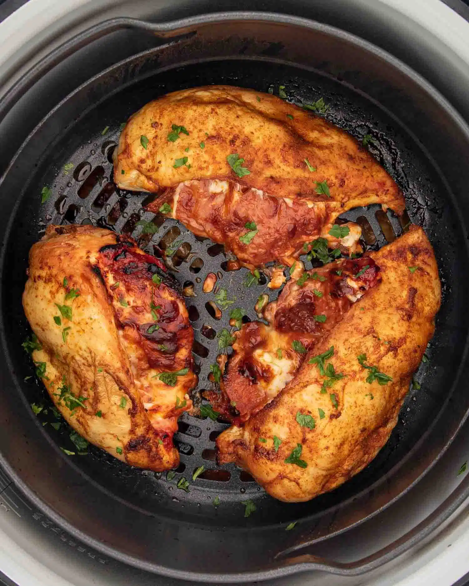 pizza stuffed chicken breasts in an air fryer.